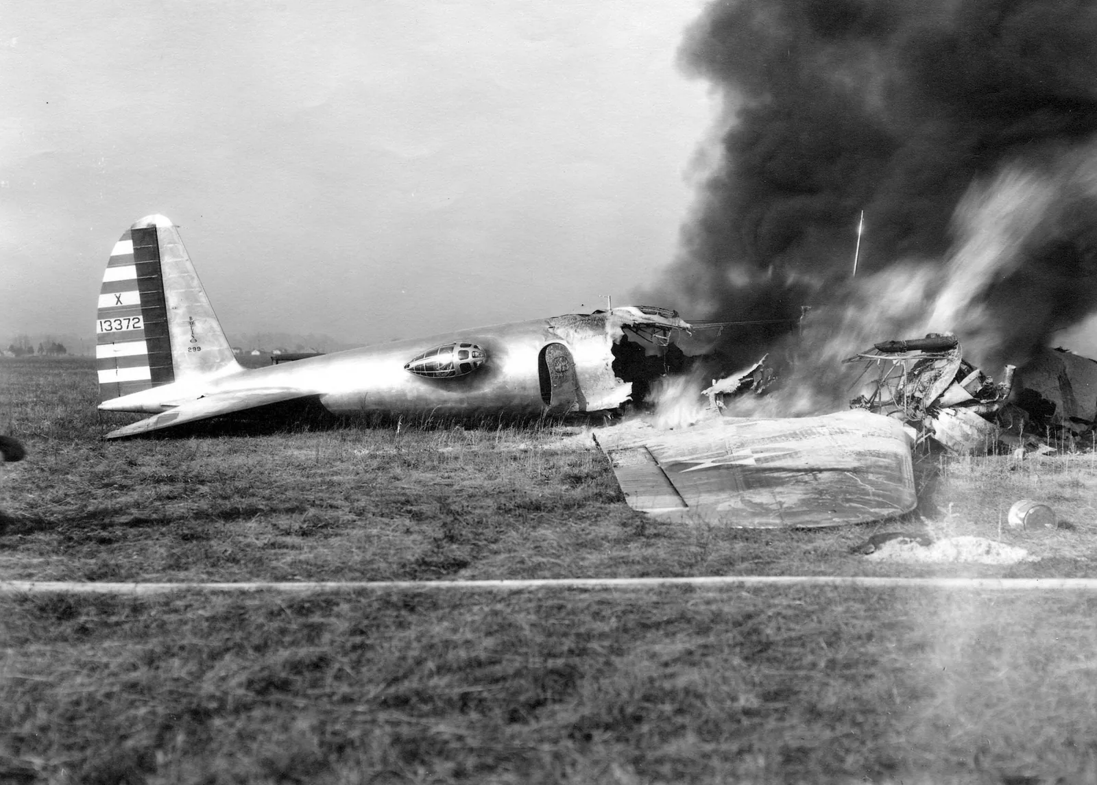 The wreck of the Boeing Model 299, NX13372, burns after the fatal crash at Wright Field, 30 October 1935.